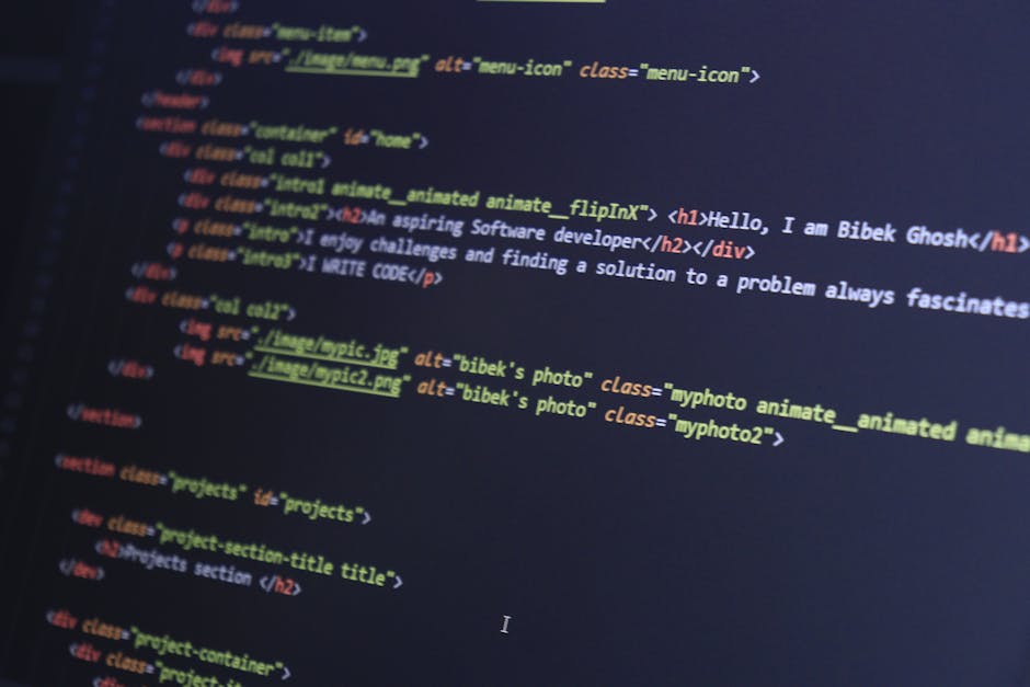 A close-up image of a computer screen displaying lines of programming code with multicolored syntax highlighting, including keywords, variables, and functions in shades of red, green, blue, yellow, an